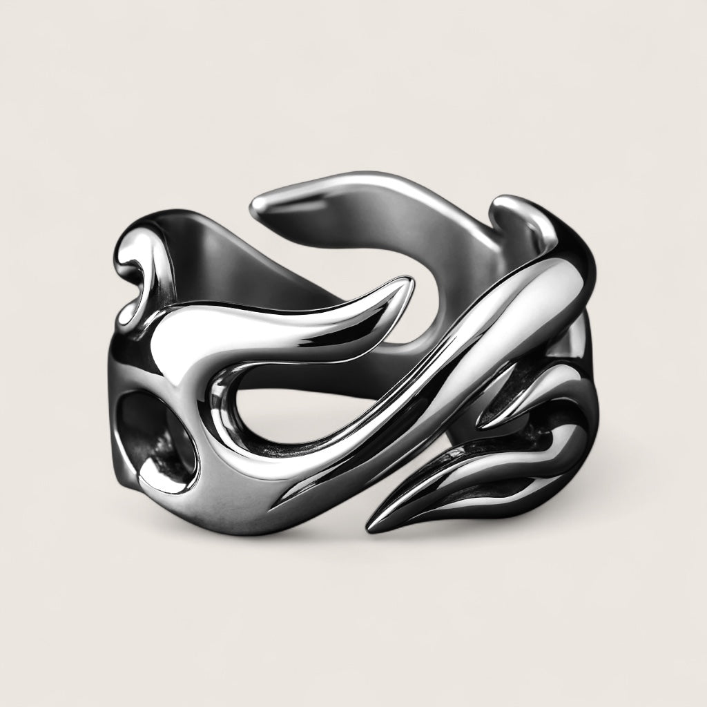 Silver ring with a unique design on a light gray background