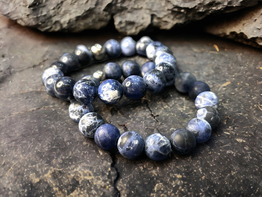 The Ethical Beauty of Layered Charm's Semi-Precious Stretch Bead Bracelets