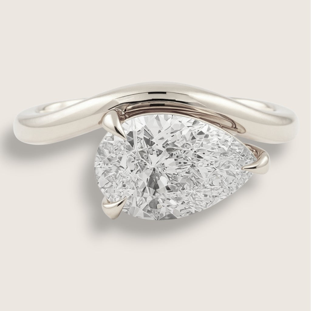 Celestial Curve – Pear Cut CZ Ring
